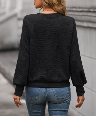 Pull col V à motifs géométriques pour femme