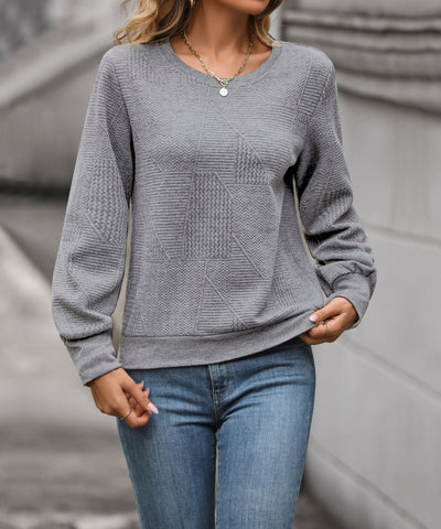 Pull col V à motifs géométriques pour femme